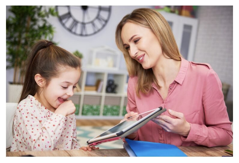 Parent and child engaged in intentional reading practice, using active reading techniques like note-taking and discussion to improve reading fluency and comprehension skills for KS2 literacy success.